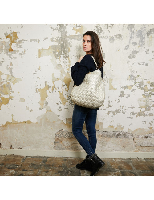 Sac DIOR en cuir matelassé perle dorée