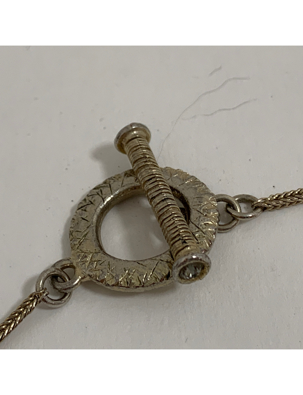 Long sautoir CHRISTIAN LACROIX doré et son pendentif argenté