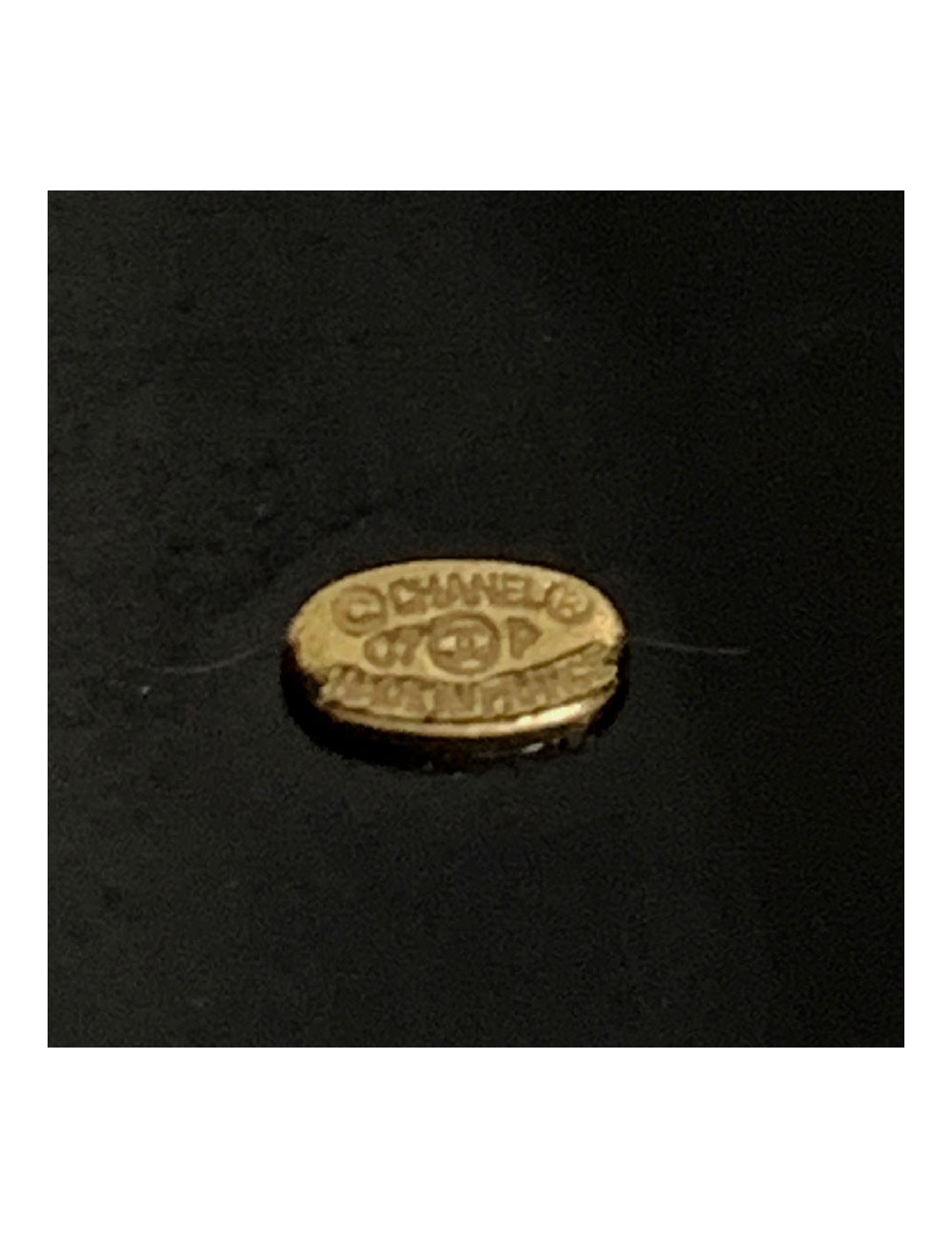 Bracelet noir CHANEL 3L'élégance c'est la ligne"