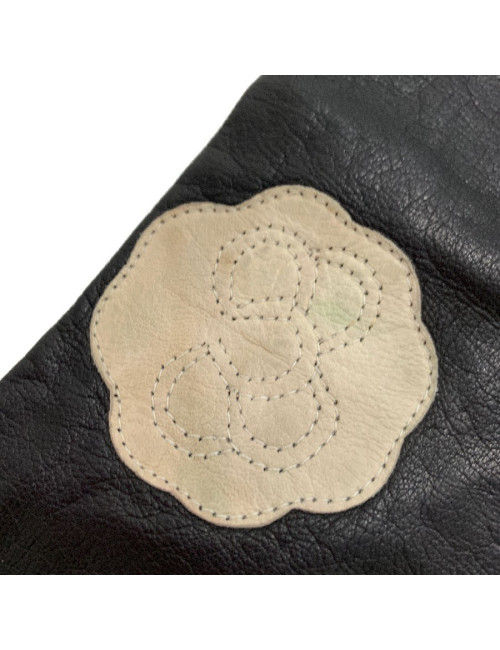 CHANEL white camellias and black lambskin long gloves