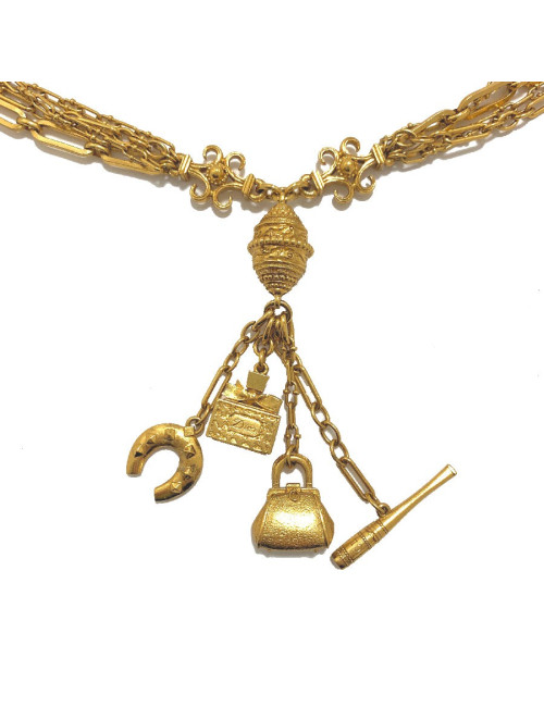 Long sautoir CHRISTIAN DIOR multi chaines et breloques dorées