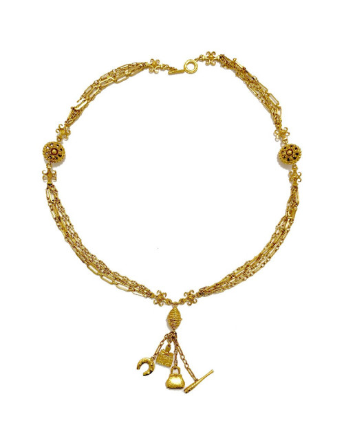 Long sautoir CHRISTIAN DIOR multi chaines et breloques dorées