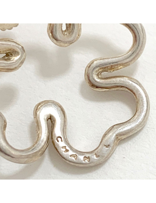 Boucles d'oreille clips CHANEL trèfles argentés