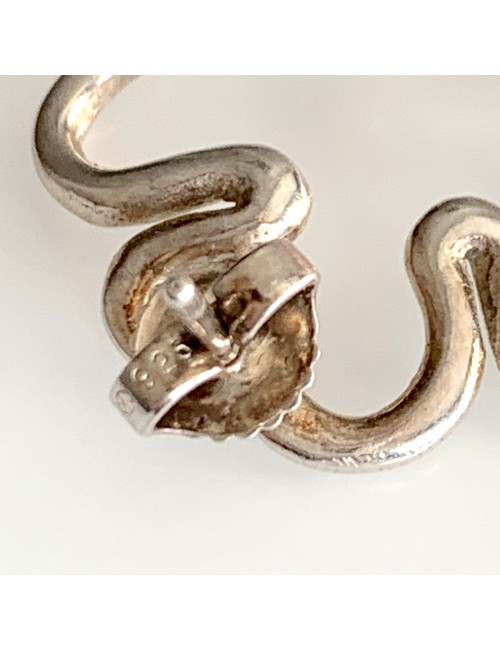 Boucles d'oreille clips CHANEL trèfles argentés