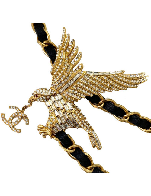 Ceinture CHANEL Aigle vintage en métal doré et cuir noir