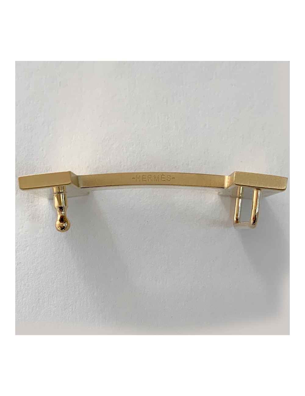 Boucle H HERMES métal doré mat