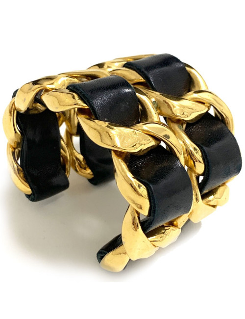 Manchette CHANEL cuir noir et or 