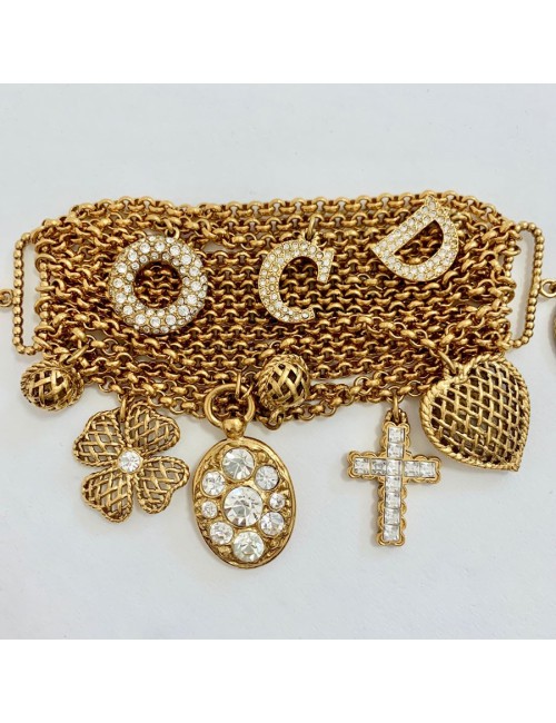 Bracelet charms CHRISTIAN DIOR doré et strass