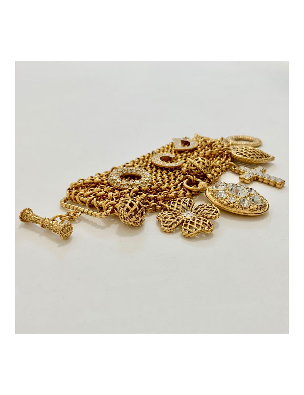 Bracelet charms CHRISTIAN DIOR doré et strass