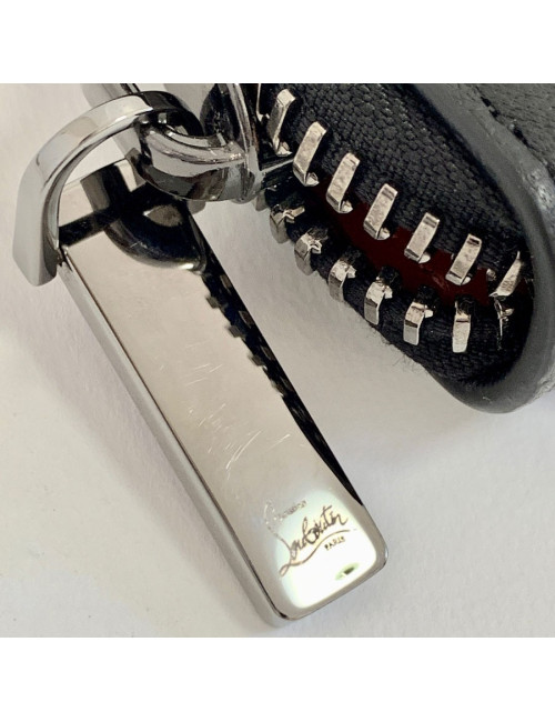 Portefeuille LOUBOUTIN en cuir noir 