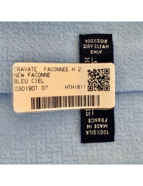 Cravate HERMES façonnée H bleu ciel en soie