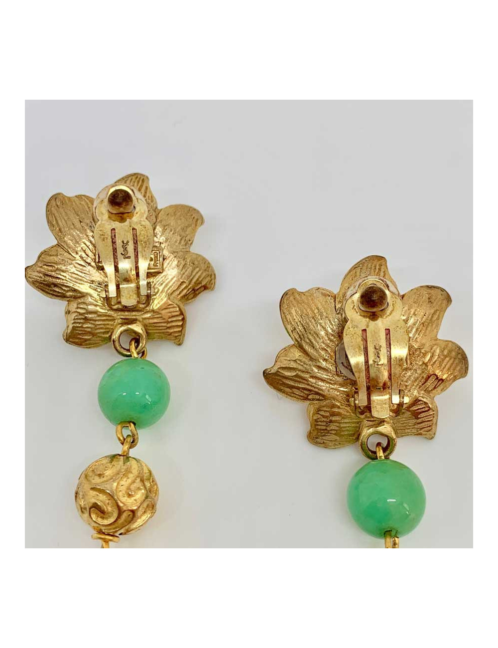 Boucles d'oreille fleur YSL vintage en métal doré