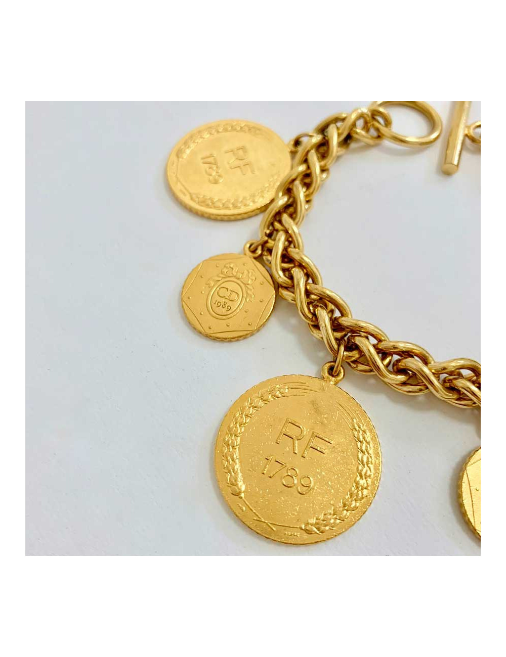 Bracelet DIOR Révolution Française breloques dorées 