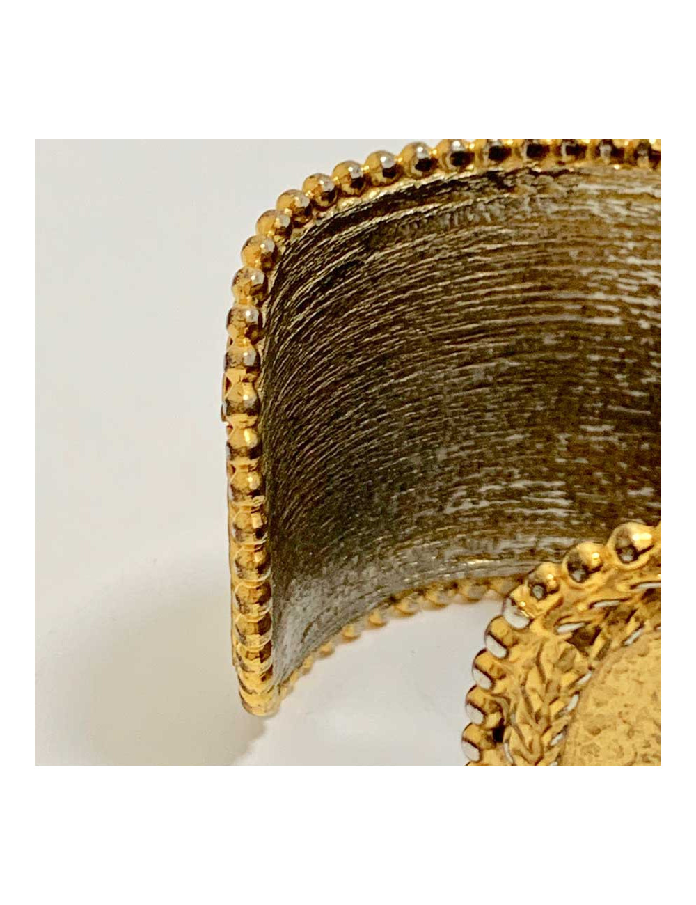 Manchette occasion dorée attribuée à la Maison DIOR