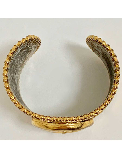 Manchette occasion dorée attribuée à la Maison DIOR