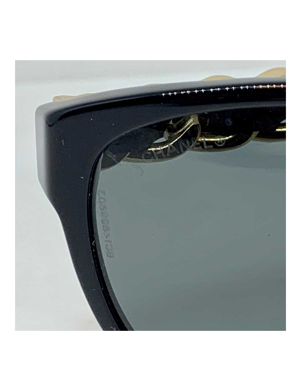 Lunettes CHANEL chaine et cuir noir et or