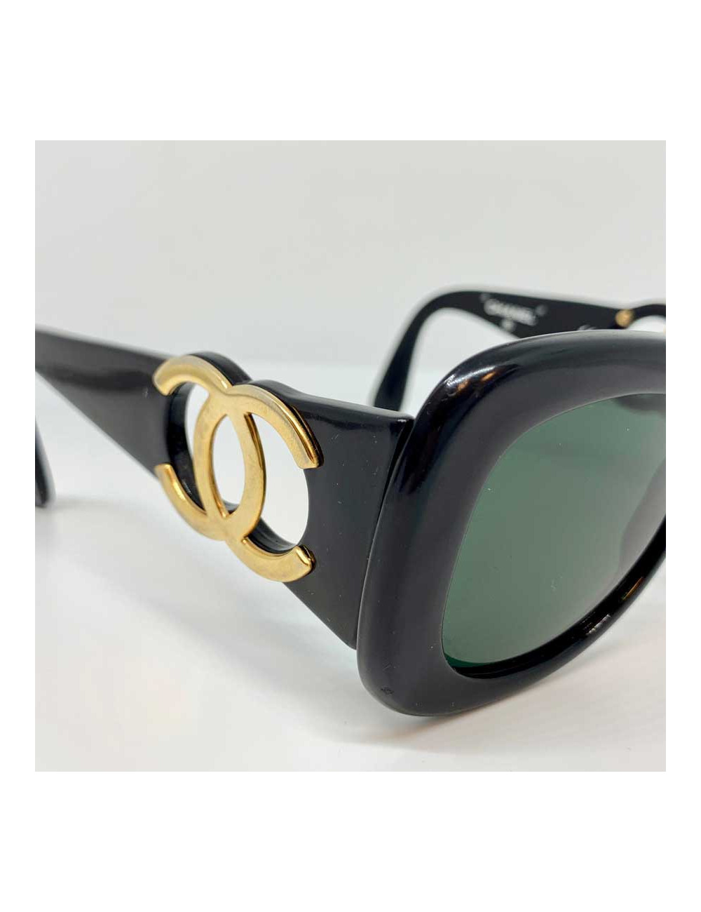 Vintage CHANEL Sunglasses CC in Gilt Metal and black acetate