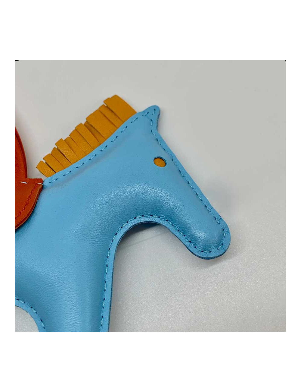 HERMES bag charm "Rodéo" in Celeste blue lambskin