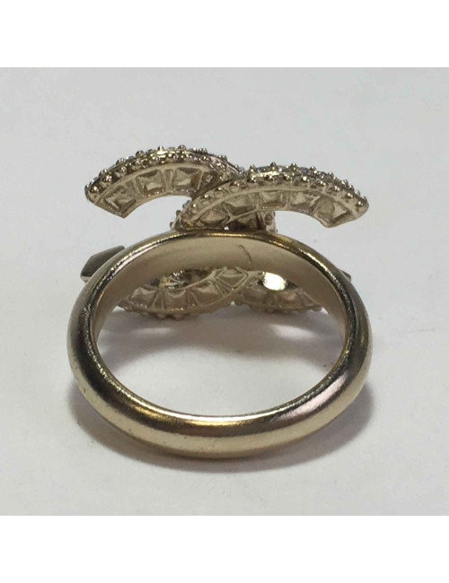 CHANEL CC ring in gilded metal and baguette cut rhinestones