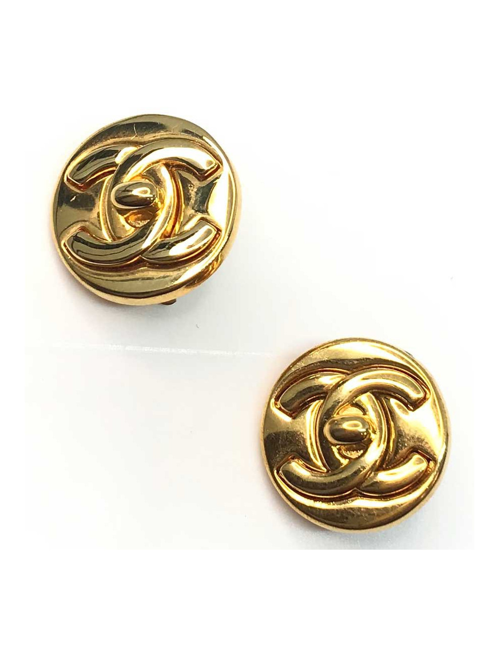 Clips CHANEL ronds dorés CC