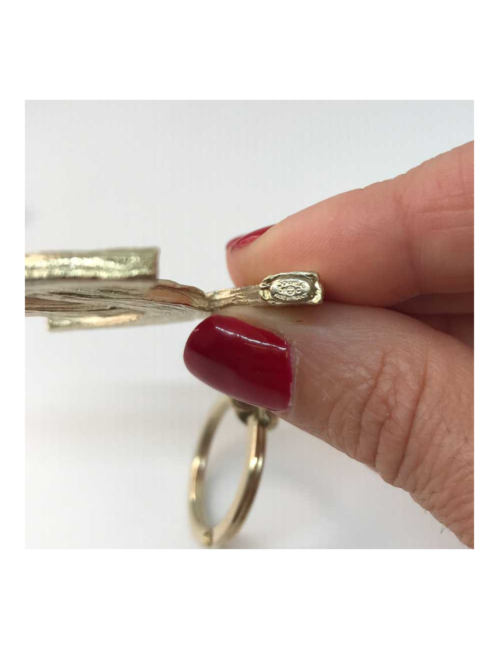 Porte-clefs CHANEL métal doré CC