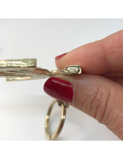 Porte-clefs CHANEL métal doré siglé C C