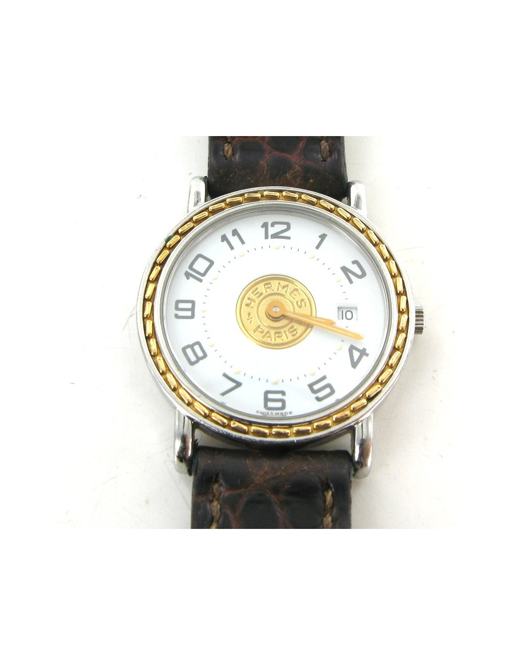 Montre HERMES seliier vintage en or et crocodile marron