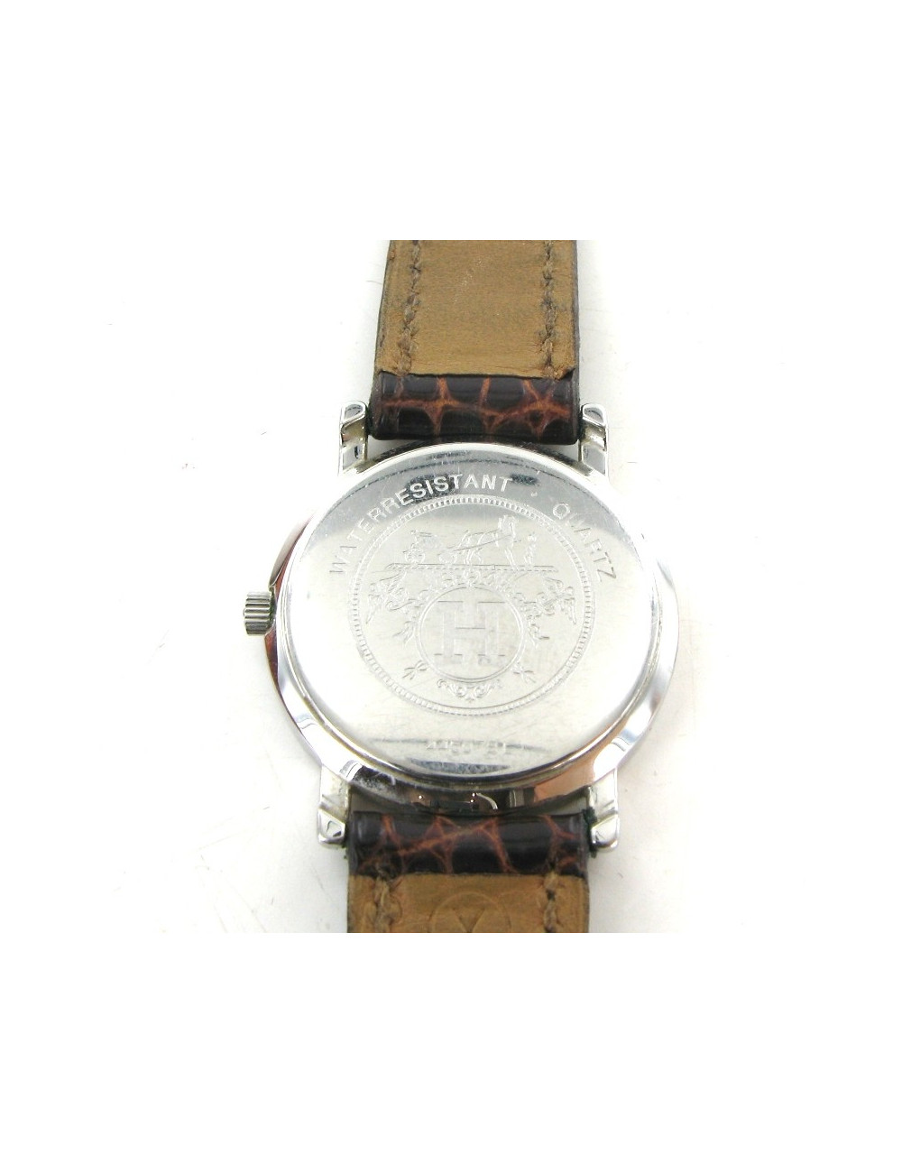 Montre HERMES seliier vintage en or et crocodile marron
