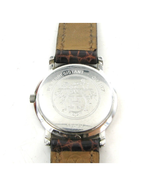 Montre HERMES sellier vintage en or et crocodile marron