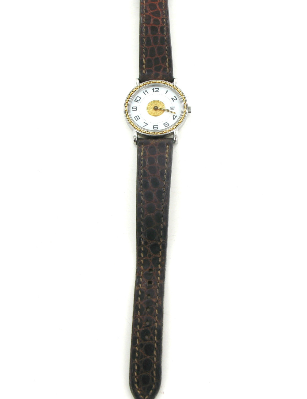 Montre HERMES seliier vintage en or et crocodile marron