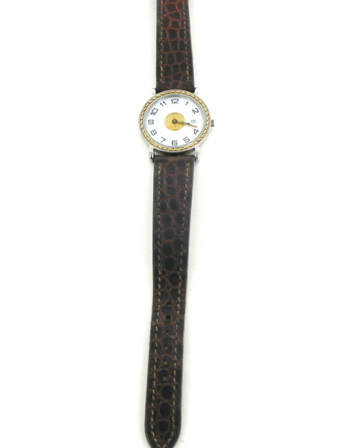 Montre HERMES seliier vintage en or et crocodile marron
