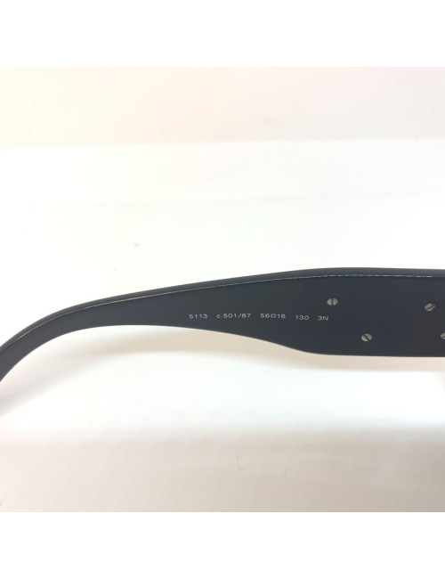 Chanel solaires noires et camélias blancs