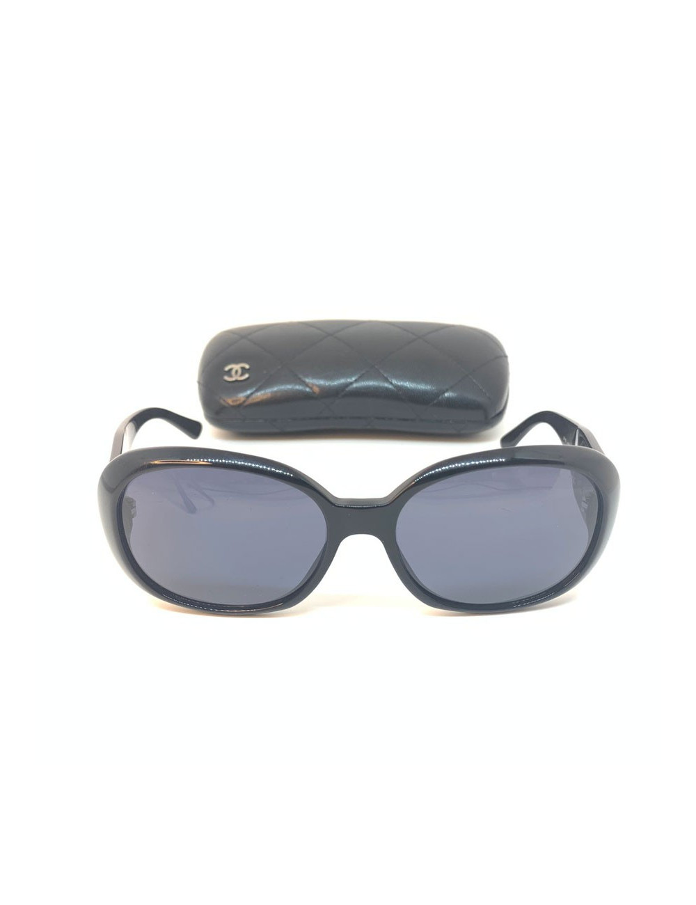 Chanel solaires noires et camélias blancs