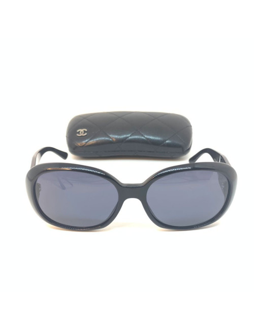 Lunettes de soleil CHANEL noires et camélia blanc