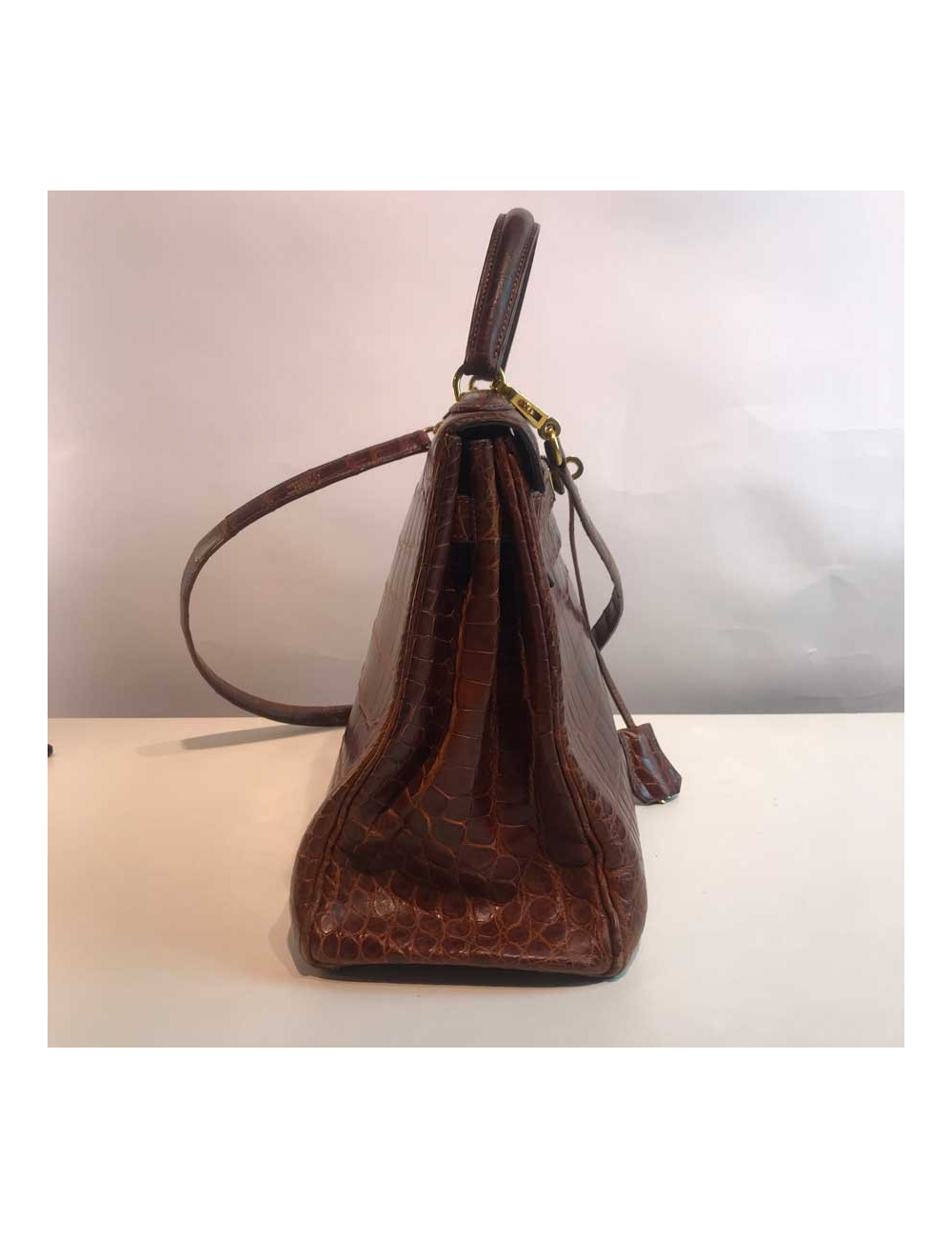 Kelly 32 alligator mat HERMES marron bijouterie or