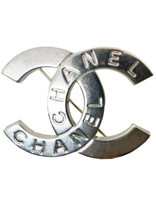 Broche CHANEL "C H A N EL" argentée