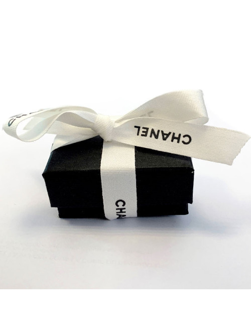 Broche CHANEL "C H A N EL" argentée