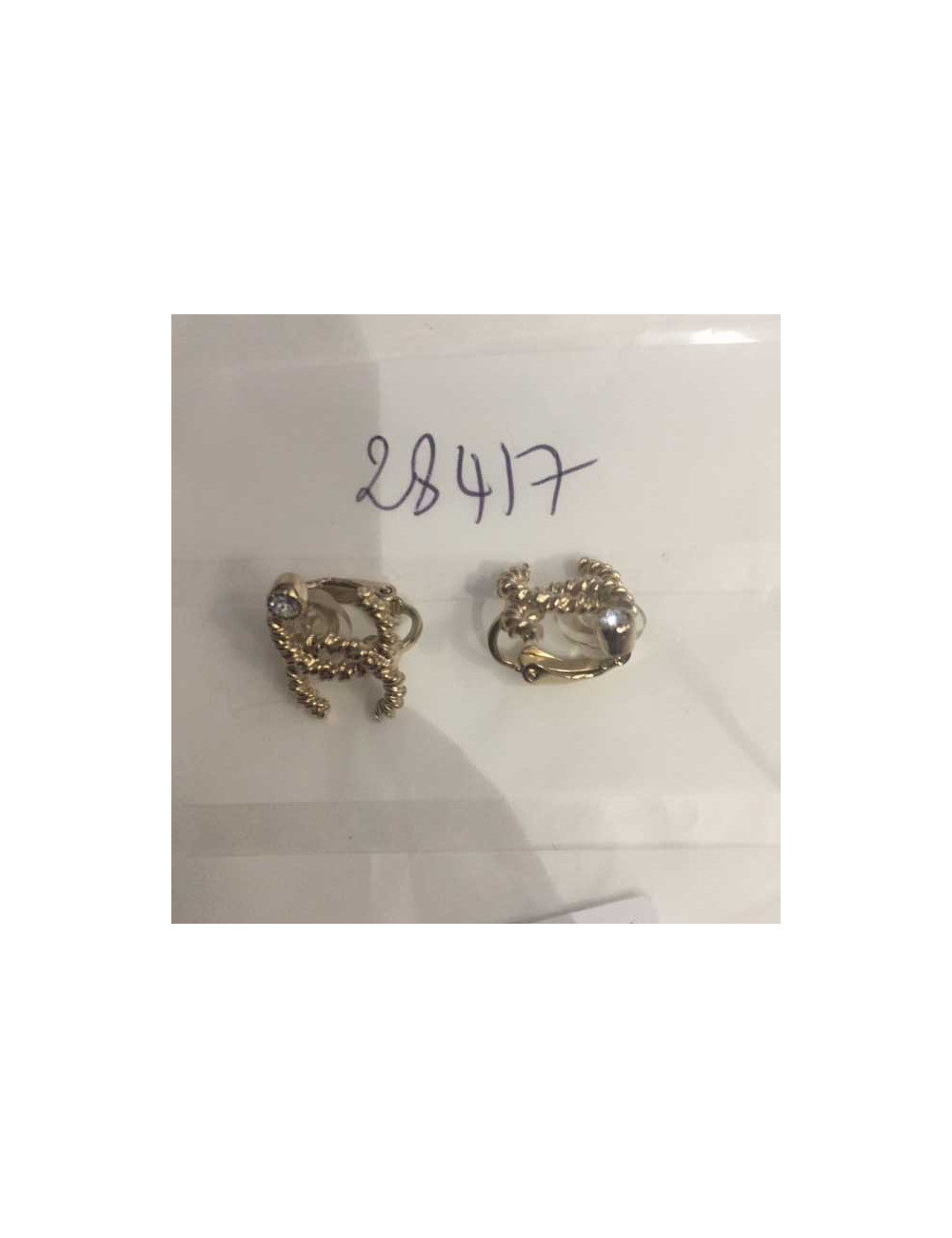 Boucles d'oreille CHANELcc doré et brillant