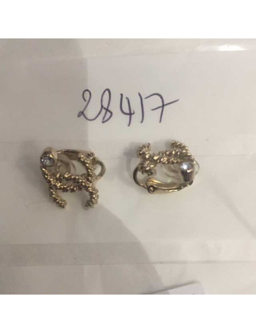 Boucles d'oreille CHANELcc doré et brillant