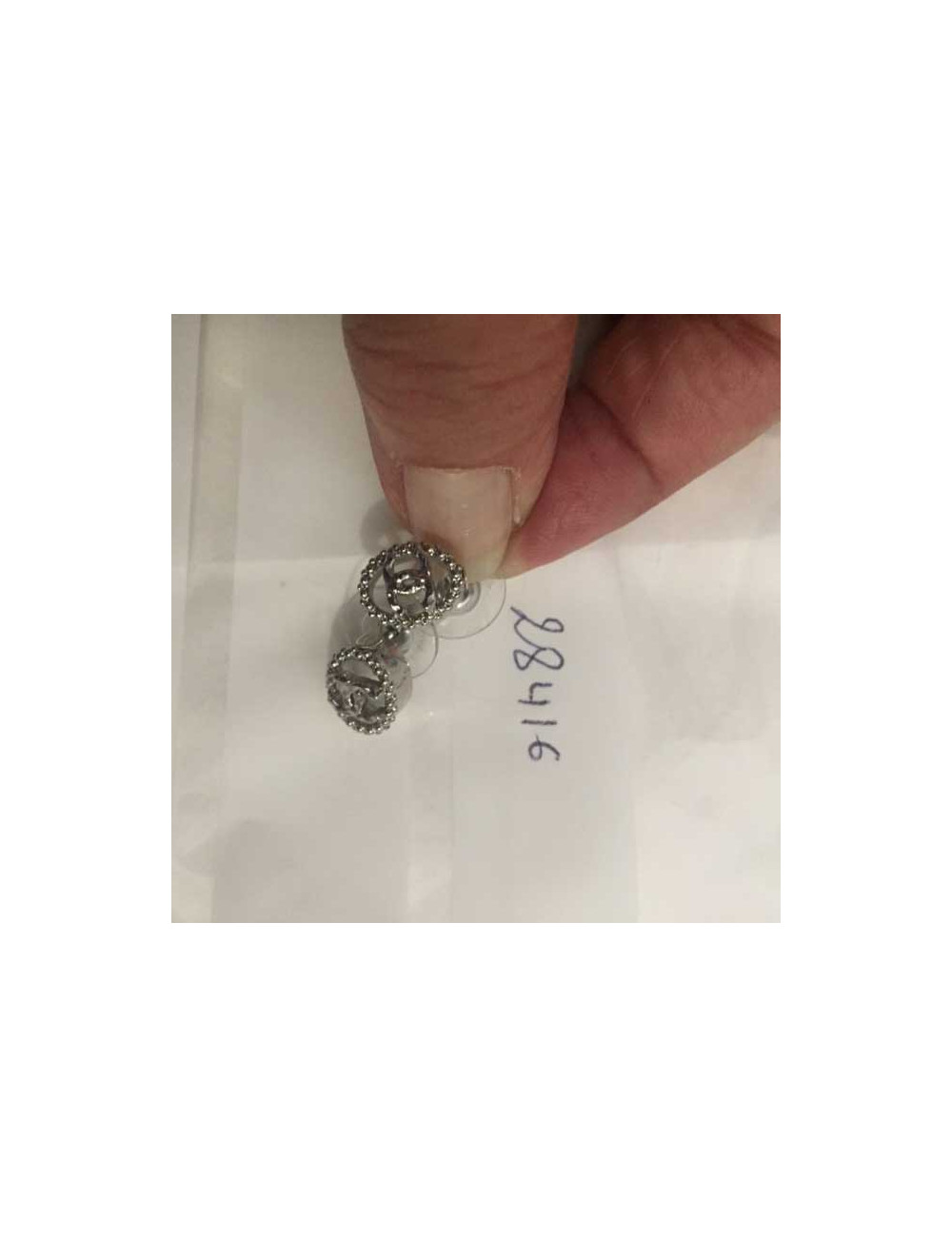 Boucles d'oreille CHANEL clous argent