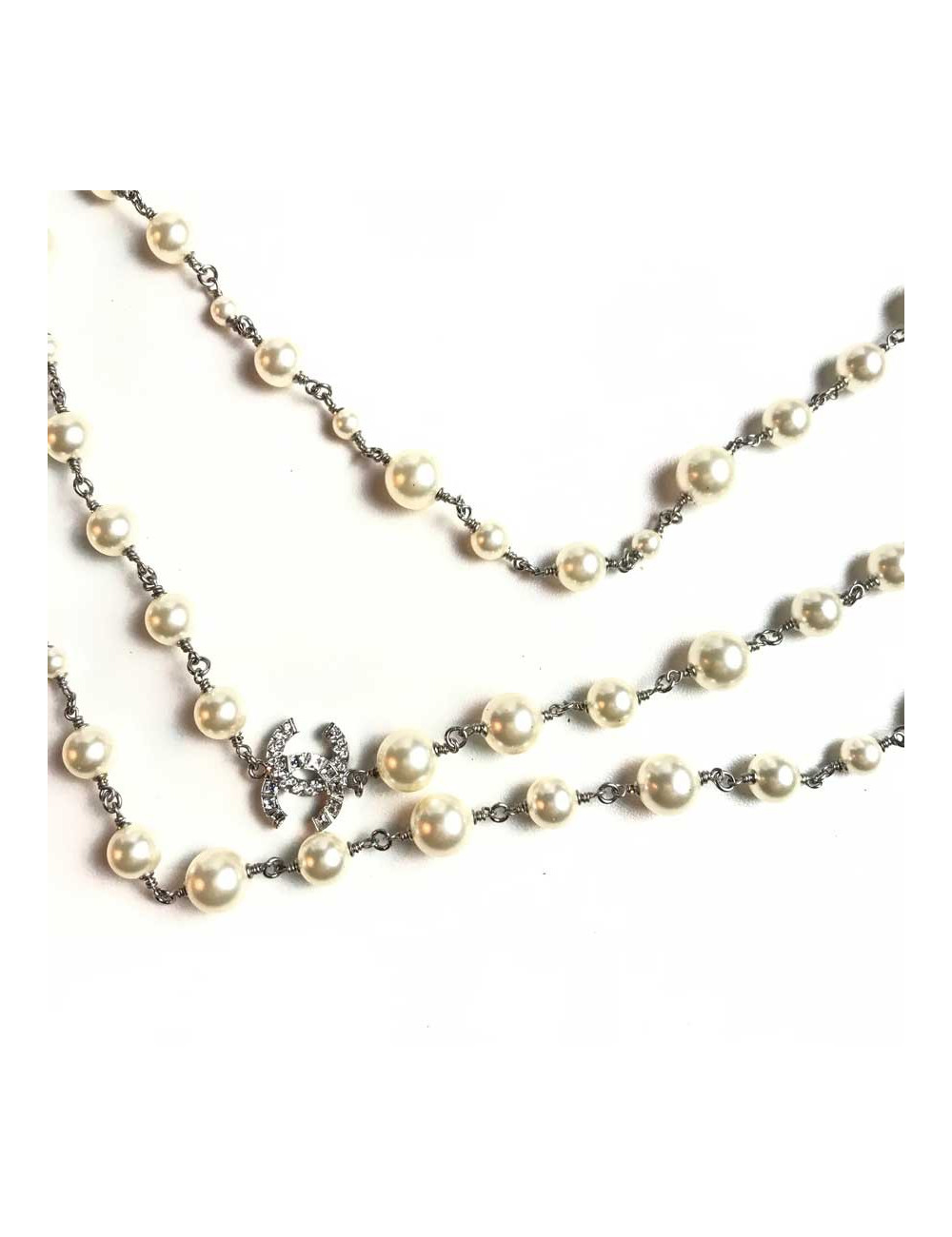 Sautoir Chanel perles blanches et noeud en strass