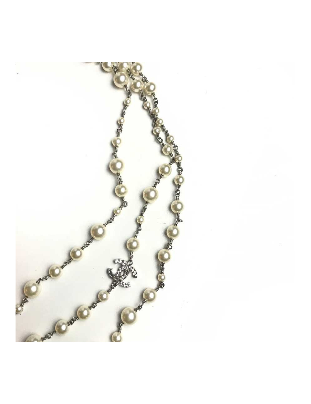 Sautoir Chanel perles blanches et noeud en strass