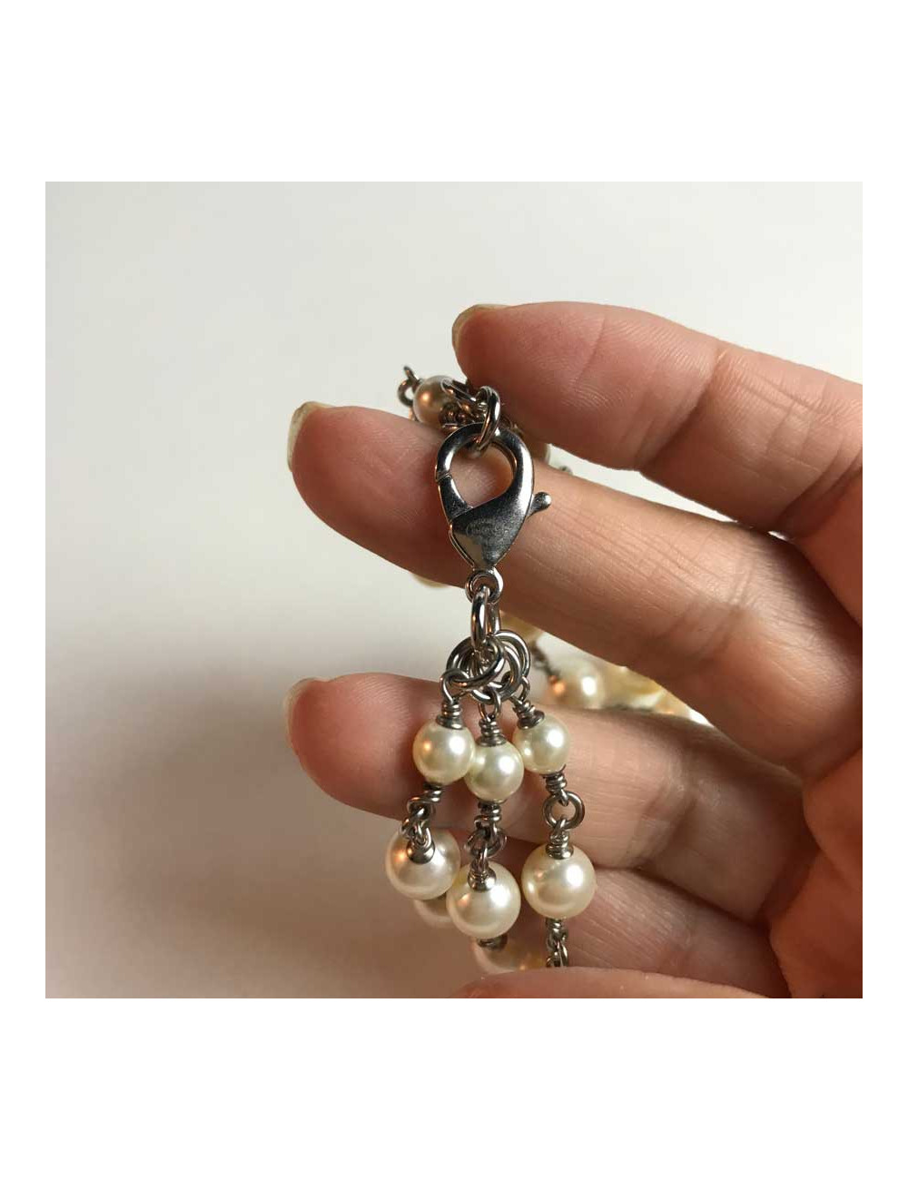 Sautoir Chanel perles et strass noeud papillon