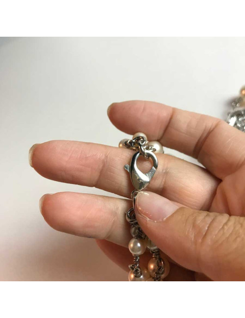 Sautoir Chanel perles blanches et noeud en strass