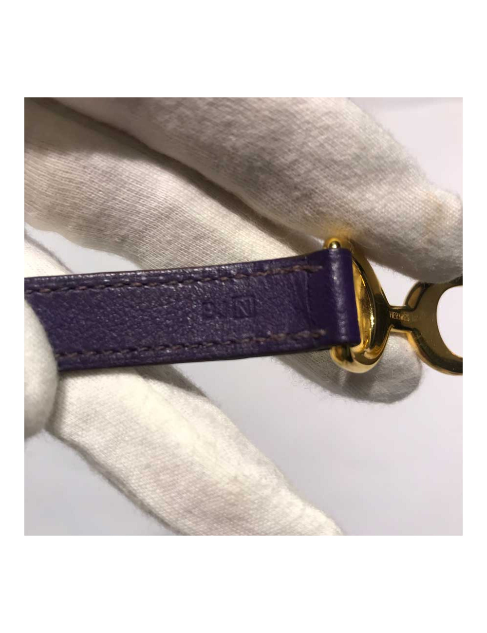 Bracelet HERMES Pavane double tour en cuir prune et mors doré