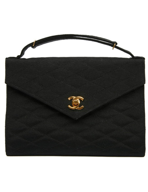Sac pochette CHANEL en tissu noir matelassé