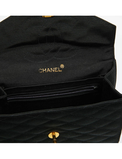Sac pochette CHANEL en tissu noir matelassé