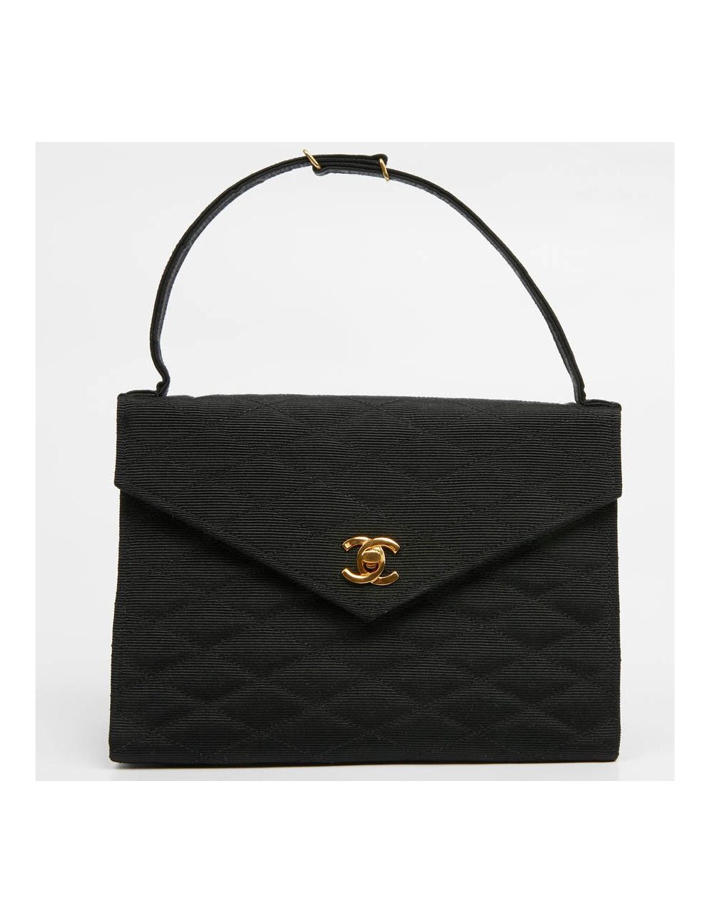 Sac pochette CHANEL en tissu noir matelassé