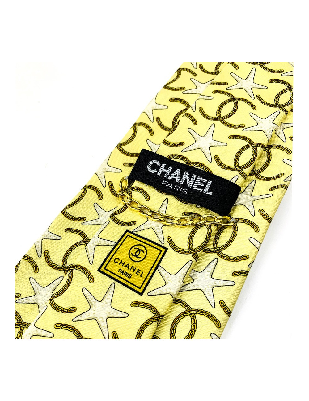 Cravate CHANEL jaune etoiles de mer et CC