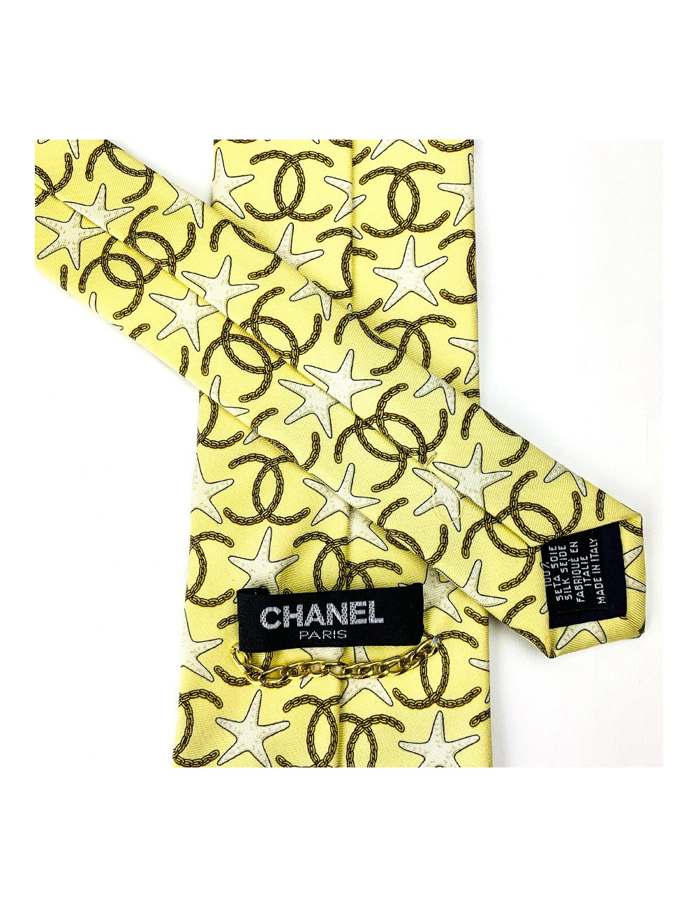Cravate CHANEL jaune etoiles de mer et CC